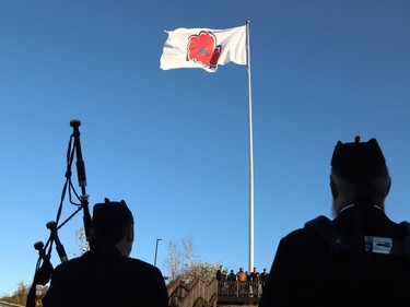 A giant poppy flag was raised to kick off the annual Royal Canadian Legion Poppy Campaign in Sudbury, Ont. on Friday October 28, 2022. Participants gathered behind the MIC restaurant on Falconbridge Road to take part in the ceremony. John Lappa/Sudbury Star/Postmedia Network