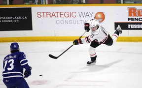 Cedrick Guindon scores a power play shot in the first period as the Owen Sound offense hosts the Mississauga Steelheads inside the Harry Lumley Bayshore Community Center on Saturday, October 8, 2022. Greg Cowan/The Sun Times