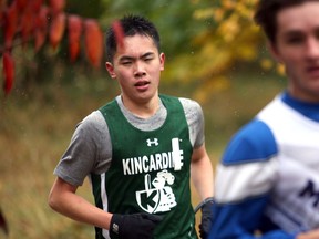 Kincardine's Tony Chen fights through a constant downpour during the Bluewater Athletic Association's senior boys cross country championship race Thursday afternoon at the Grey Sauble Conservation Authority headquarters in Owen Sound. Tristan Bouius (JDSS) won the senior boys race while Brooklyn Quanz (SDSS) won the senior girls race, Ava Moric won the junior girls race (JDSS), James Wheeler won the junior boys race(BPDS), Kiera Snelling won the novice girls race (OSDSS) and Eli Bouius won the novice boys race. (JDSS). Greg Cowan/The Sun Times