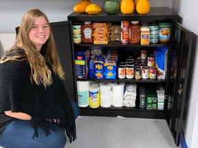 Millet mental health coordinator Hailey Glover with the Community Pantry recently installed at the Millet Agriplex.
Christina Max