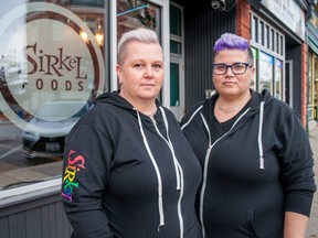 Mel Lang (left) and Kelly Ballantyne, a married couple who own Sirkel Foods in downtown Stratford, are grateful for the community support they’ve received after their restaurant was spray painted with homophobic graffiti this week. Still, they’ve decided to purchase security cameras, Ballantyne said. Chris MontaniniStratford Beacon Herald