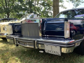 Mikael and Dennis Ocolisan of Komoka their 1980 Lincoln Continental Mark VI on display at the Old Autos car show in Bothwell in August. Peter Epp photo