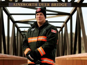 Firefighter Jeff Readman poses for a photo on the Ainsworth Dyer Memorial Bridge, in Edmonton, Wednesday, Nov. 3, 2021. PHOTO BY DAVID BLOOM / Postmedia.