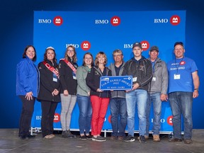 The McKerrall family of Chatham was recently named a BMO Family of the Year at the 2022 International Plowing Match and Rural Expo in Kemptville, Ont.. Shown here are an unnamed BMO representative; Maranda Klaver, 2022-23 Ontario Queen of the Furrow; Anna Lennox, 2021-22 Ontario Queen of the Furrow; Lauren McKerrall; Maureen McKerrall; Rob McKerrall; William McKerrall; Robert MacLean, Ontario Plowmen's Association President; and Roger Robertson from BMO. (Handout/Postmedia Network)
