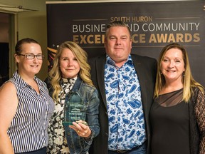 From left are Amber Preszcator of JMR Electrical, Michelle Hansen, Mike Hansen and South Huron Chamber of Commerce board member Teresa Van Raay. The Hansens were recognized with the Lifetime Achievement award. Alec Moore