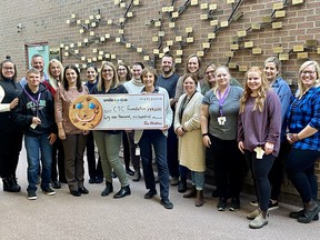 Local Tim Hortons locations donated $49,600 to the Childrens Treatment Centre Foundation of Chatham-Kent, using proceeds from September's Smile Cookie campaign. Shown here are Tim Horton’s owners Mike and Paul Grail and Jessica Pritchard with staff from the Children’s Treatment Centre. (Handout/Postmedia Network)