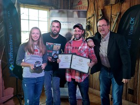 The Red Barn Brewing Co. recently took home two provincial tourism awards from the Tourism Industry Association of Ontario in the categories of collaboration and innovation for organizing Farm Fest 2021. Seen from left are co-owners Sandy Vervaet, Daniel English and Denny Vervaet, being presented the awards by Chatham-Kent Mayor Darrin Canniff. Ellwood Shreve/Postmedia