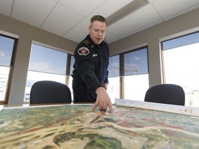 Regional Municipality of Wood Buffalo Fire Chief Jody Butz speaks about the fight against the 2016 Horse River wildfire during an interview in Fort McMurray on Monday, April 3, 2017. Ian Kucerak / Postmedia