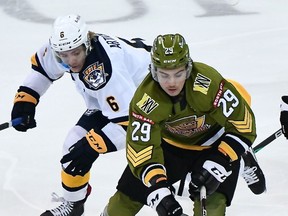 Nic Sima of the North Bay Battalion escapes Taeo Artichuk of the host Erie Otters in their Ontario Hockey League game Saturday night. The Troops host the Guelph Storm at 7 p.m. Thursday.