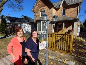 Mental Health Network of Chatham-Kent executive director Kelly Gottschling, left, and member Cathy Harback are seen here in front of 71 Raleigh St. in Chatham, where the agency provides services and support to 300 people age 16 and up who have mental health issues. Ellwood Shreve/Postmedia