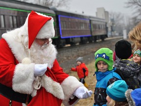 Santa Claus hands out candy canes to children attending the 2018 CP Holiday Train event in Chatham. The train will return to Chatham on Dec. 1 at 2:30 p.m. (File photo/Postmedia Network)