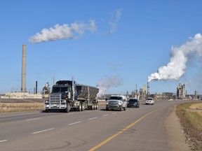 Traffic moves south on Highway 63 past Syncrude, north of Fort McMurray, Alta. on Tuesday September 27, 2016. Cullen Bird/Fort McMurray Today/Postmedia Network