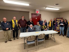 Lion Nicole Oshell, President of the Powassan Lions Club, along with fellow Lions present the North Bay Regional Health Centre Foundation with their final payment on their $25,000 pledge to the Cancer Care, Close to Home Campaign.