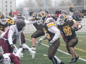 Korah Colts offensive lineman Dante Scaglione (#98) runs the rock, on the way to scoring his first high-school touchdown against the Algonquin Bears in the NOSSA final at Superior Heights on Nov. 12.