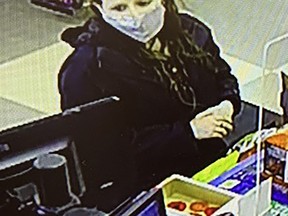 Kingston Police are searching for this woman in relation to credit card fraud that took place in Kingston on Nov. 7.