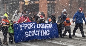 Port Dover Scouting members were among the many community groups and organizations to participate in Saturday's Christmas Festival and Santa Claus parade.  Vincent Ball