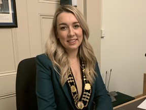 Norfolk County Mayor Amy Martin took her place in the mayor's chair and wore the chain of office after being sworn in at the inaugural meeting of the new council on Nov. 15. Vincent Ball