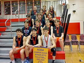 Lasalle Secondary School players and staff celebrate their 2022 NOSSA senior boys volleyball championship.