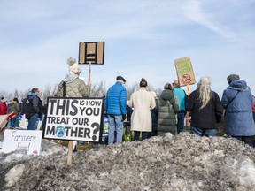 Protestors opposed to Ontario's Bill 23 rally in front of MPP Todd Smith's office in Prince Edward County on Thursday. ALEX FILIPE