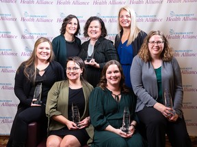 The Chatham-Kent Health Alliance recently awarded employees at its annual service recognition ceremony. Shown in the back row are Tina Labute, Compassionate Caregiver Award of Distinction; Colleen Lewis, Equity, Diversity and Inclusion Award; and Rachel Boucquez, Compassionate Caregiver Award of Distinction. In the front row are Kelly Barreira, Vicente and Delia Calma Memorial Nurse Excellency Award; Stephanie Davidson, Resiliency Award; Nadine Neil, Vision Award; and Kyla Hayward, Stroke Care Award. Also awarded were Jamie Shields, Mission Award; Debbie Pepper, Values Award; and Lana Timms, Compassionate Caregiver Award of Distinction, not pictured. (Handout/Postmedia Network)