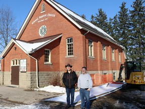 The installation of a new lift at the 110 year-old Arkona Baptist Church will be taking place over the winter, said church Pastor Rob Spicer (left) and project manager Brent Lancaster (right).  Carl Hnatyshyn/Sarnia This Week