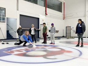 Curling For Newcomers program attendees were very attentive as Sherwood Park's Heather Nedohin taught them the basics of the sport. Lindsay Morey/News Staff