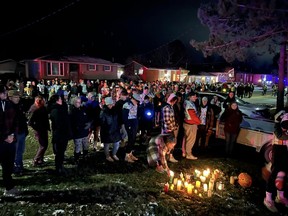 The North Bay Bulldogs community rallied together Tuesday evening outside the home of Alex Jessup to pay tribute to their friend and fellow teammate. Jessup died Sunday at Dalhousie University in Halifax.