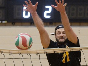 Sven Trodel in action with the Cambrian College men's volleyball team.