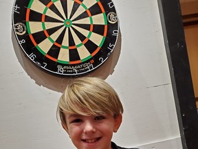 Jaxson Danis poses after qualifying for the Dart Masters tournament in 2020. Photo supplied.