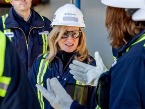 NDP opposition leader Rachel Notley speaks with workers at Inter Pipeline during her Nov. 18 visit to the site. Photo supplied.
