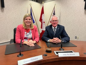 Corina Parisien, left, was elected for her first term as vice chair of the board of trustees, while John McAllister, right, was given a fifth year as chair.