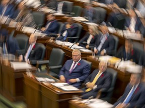 Ontario Premier Doug Ford sits in the Ontario Legislature during Question Period on Tuesday November 1, 2022, as members debate a bill meant to avert a planned strike by 55,000 education workers. The Ontario government's use of the notwithstanding clause in an attempt to pre-empt a strike by education workers sets a dangerous, draconian precedent, labour experts say, with serious implications for collective bargaining across Canada.THE CANADIAN PRESS/Frank Gunn