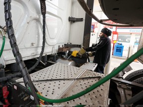 Jatinder Bal fills his semi-truck with over 500 litres of diesel at an Esso Station on 32nd Street N.E. before a trip to Utah on Thursday, September 22, 2022. 
Gavin Young/Postmedia
