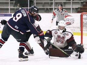 Chatham Maroons goalie Luka Dobrich makes a save on LaSalle Vipers' Jake Eaton (9) in the third period at Chatham Memorial Arena in Chatham, Ont., on Saturday, Nov. 26, 2022. Mark Malone/Chatham Daily News/Postmedia Network