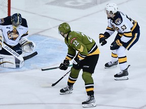 Matvey Petrov of the North Bay Battalion scores Saturday night against goaltender Nolan Lalonde of the host Erie Otters. Petrov was recognized Monday as the Ontario Hockey League's Player of the Week.