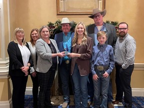 The High River District Health Care Foundation’s Rhonda Bew and Cathy Couey, Association of Fundraising Professionals (AFP) Chapter President Marni Halwas, Longview 4-H Club’s Stephen Hughes, Kate Wedderburn, Blake Kilpatrick and Ross Lewis, and AFP member Jason Lyver.
