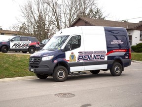 Forensic officers from Waterloo Regional police assisted Woodstock police in the investigation of a suspicious death at an apartment complex at 161 Fyfe Ave.  in Woodstock on Tuesday, Nov. 29, 2022. (Derek Ruttan/The London Free Press)