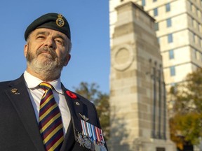 Randy Warden, chairperson of the Royal Canadian Legion's Remembrance Day Committee in London, stands near the Cenotaph at Wellington Street and Dufferin Avenue in London on Thursday, Nov. 3, 2022, as he and other organizers get ready for the return of restrictions-free Remembrance ceremonies. (Mike Hensen/The London Free Press)