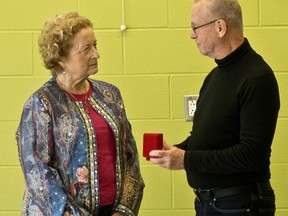 Grey Highlands resident Lynn Silverton receives the YMCA 2022 Peace Medal at a ceremony from Brian Minielly, on the peace medal committee Thursday, Nov. 17, 2022 at the Y in Owen Sound. (Michael McLuhan photo)
