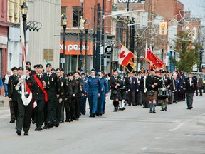 The parade to the cenotaph in Owen Sound, Ont. on Friday, Nov. 11, 2022. People clapped as they marched past. (Scott Dunn/The Sun Times/Postmedia Network)