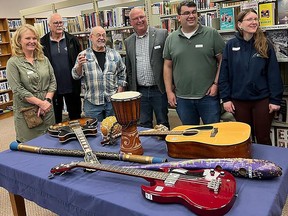 Stirling Library's Musical Instrument Lending Library (MILL) held a recent open house to showcase the MILL plus other new library services such as the launch of a new interactive website for the MILL (stirlingmill@xplornet.ca ) and a new audio-visual capacity. These additions were made possible by a grant from Ontario's Trillium Foundation, arranged through Hastings-Lennox and Addington MPP Ric Bresee. The new library offers its services through eight other libraries: Trenton, Brighton, Campbellford, Warkworth, Hastings, Marmora, Madoc and Belleville. The reporter, who originally covered the event, apologizes for overlooking these important aspects of the event. Pictured, from the left, are: Susan Carleton-Maines (President of the Board, Stirling MILL), Bob Mullin (Mayor, Stirling-Rawdon), James Reid (Curator, Stirling MILL), Ric Bresee (MPP, Hastings - L&A), Dan Guerreiro (Director/Treasurer, Stirling MILL), Beth Douglas (Directory/Secretary, Stirling MILL).  SUBMITTED PHOTO