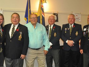 The Norwood Legion recognized the incredible contributions made by its members at their Honour and Awards Night held in traditional fashion for the first time in two years on November 5. Five Associate Members were recognized for 50 years of service each.

From left Honour and Awards Chair Julie English, 50 year members Wilburn Archer, Don Sampson, Randy Webb and Richy Webb and Legion President Kevin English. 50 Year pin recipient William Drain was unable to attend. SUBMITTED PHOTO