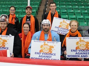Orange Campaign support – Left to right, back row: Breanna Matthewes, senior vice-president business operations; Frederic LeMay, Belleville Senators video coach and team affairs; Alex Siragusa, senior vice-president ticket sales and services; front row: Sens player Mads Sogaard; Hilary Wells, Belleville Sens massage therapist; Jonathan Spirot; Judith Zeldimanovits and Mary Zadow,  GranQuinte representatives. JACK EVANS PHOTO