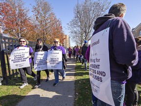 Striking education workers represented by CUPE picket outside the constituency office of Brantford-Brant MPP Will Bouma for a second day on Monday in Brantford.