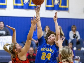 Olivia Saylon of the BCI Mustangs launches a shot that would score two points during an AABHN high school senior girls semifinal basketball game against the North Park Trojans on Thursday. Brian Thompson/Brantford Expositor/Postmedia Network
