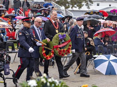 Brian Coleman, representing the County of Brant, and Brantford mayor Kevin Davis prepare to lay wreaths at the Brant County War Memorial on Friday November 11, 2022 during the Remembrance Day service in Brantford, Ontario. Brian Thompson/Brantford Expositor/Postmedia Network