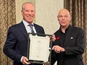 Brantford's Mike Breuls (left), pictured with Mick Ferras, was recently inducted into the Ontario Blind Sports Association Hall of Fame. Submitted