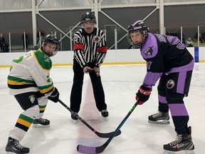 Carson Johnston  of London faces off against Noah Basnjak of Brantford 99ers as referee D. J. McQueen prepares to drop the puck at the start of a Hockey Fights Cancer game at the Wayne Gretzky Sports Centre on Saturday, Nov. 19. VINCENT BALL
