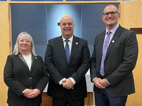 Rick Petrella (center) has begun his ninth year as chair of the Brant Haldimand Norfolk Catholic District School Board.  Serving as vice chair for the fourth consecutive year is Carol Luciani (left).  With them at the board's inaugural meeting is Mike McDonald, director of education.  Submitted Photo