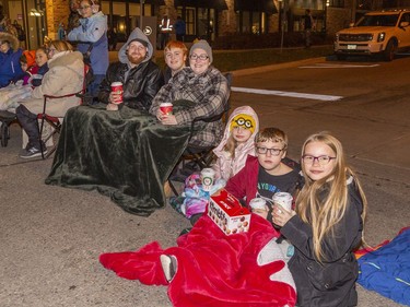 Well-prepared for the Brantford Santa Claus parade with blankets, chairs, warm drinks and snacks are (from left) Jessie Melnick, Noah Cullen, Samantha Cullen, Arbor Run, Grayson Run and Xayleia Melnick of Brantford. on Saturday November 26, 2022 in Brantford, Ontario. Brian Thompson/Brantford Expositor/Postmedia Network